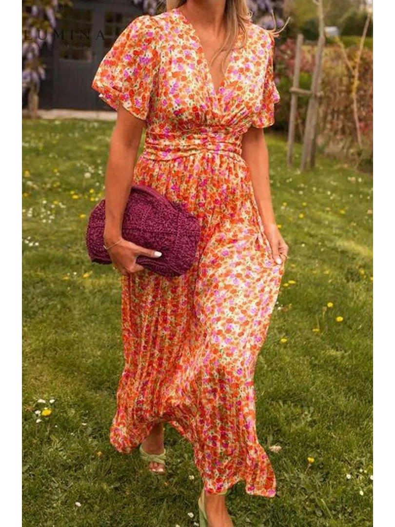 Aveline | Women's Wedding Guest Dress With Flutter Sleeves And Floral Print